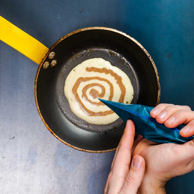 making the cinnamon swirl vegan pancake