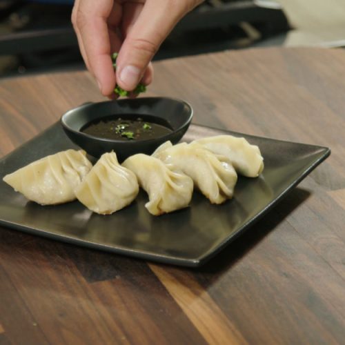 Sausage-Fried-Onion-and-Cabbage-Potstickers-850x625
